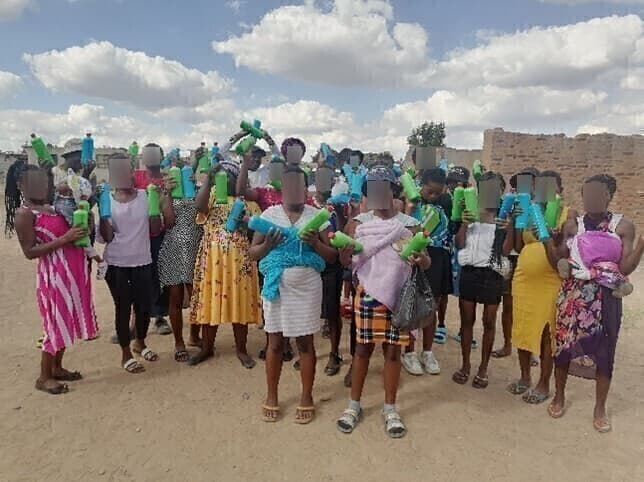 Young mothers and adolescents receiving support at a community outreach